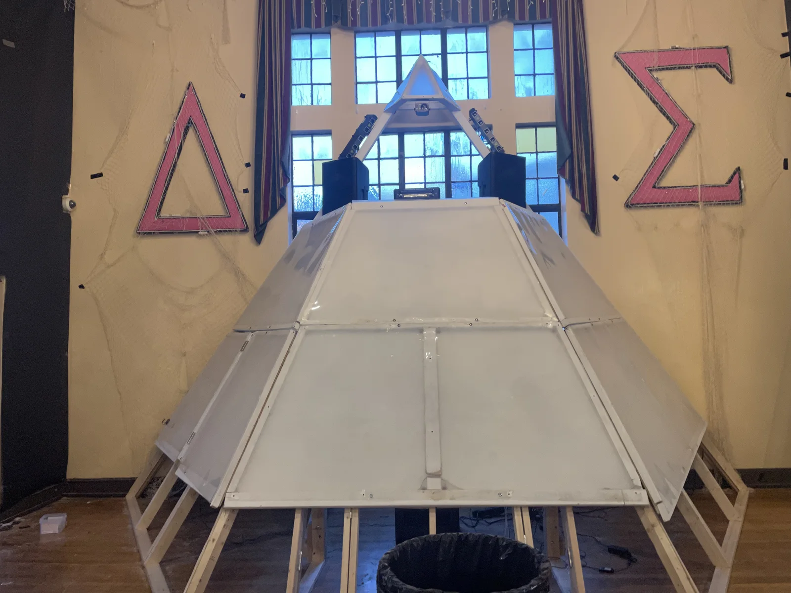 Completed collapsible 21-foot DJ pyramid and its construction
